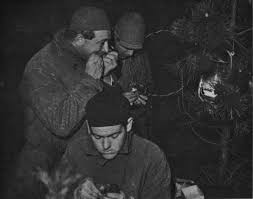 Ringing of common starlings in the middle of the night near the Hague in 1931. From front to back: dr. K. Waldeck, dr. J.C. Koch (not eating the starling but closing the ring with his teeth) and J.P. Bouma. Photo: F.P.J. Kooijmans.